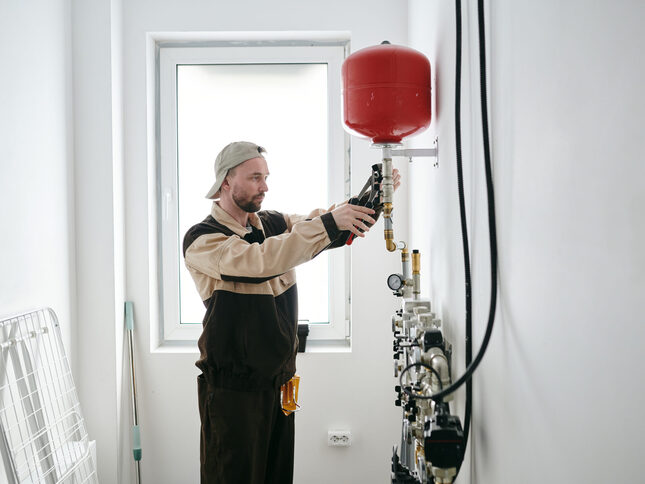 modern-plumber-fixing-new-equipment-in-house-or-ap-2025-03-15-05-21-47-utc-scaled